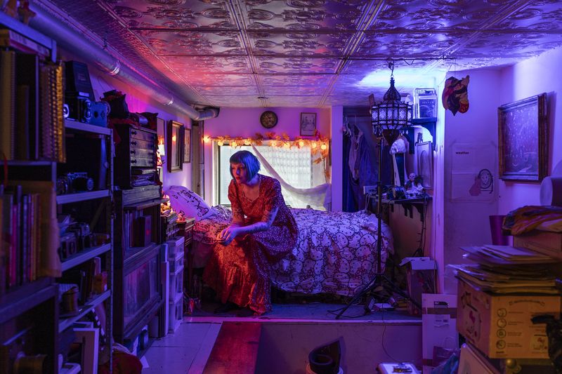 © Elisa Maenhout - Amy Rose Performing a Small Ritual on Her Nightstand, New York City, NY, USA, 2025