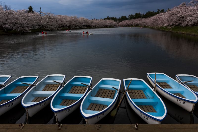 © George Nobechi - Rowboats and Storm