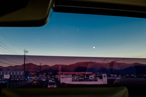 © George Nobechi - Moonrise Bus Ride, Nagano 2016