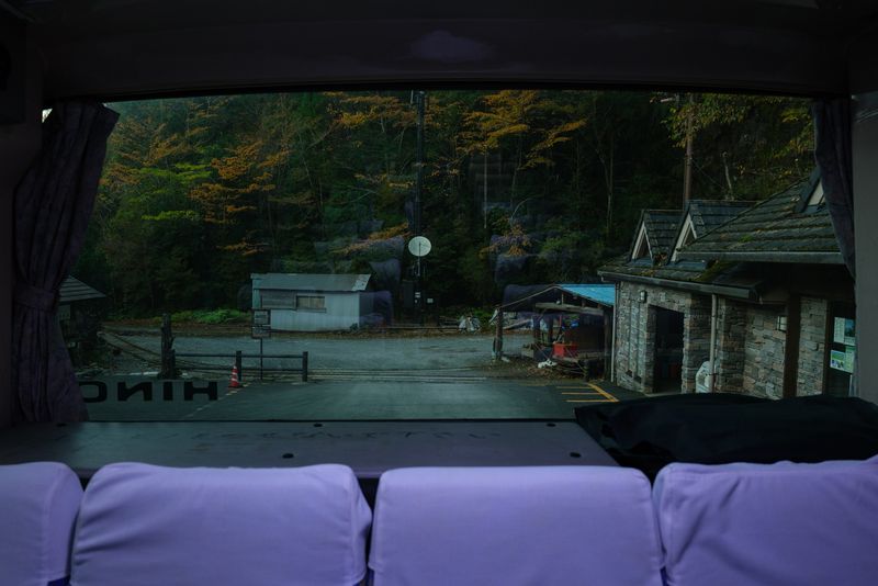 © George Nobechi - Leaving the forest of the 7,000 year old Jomon Sugi tree after a 12-hour hike, Yakushima 2025