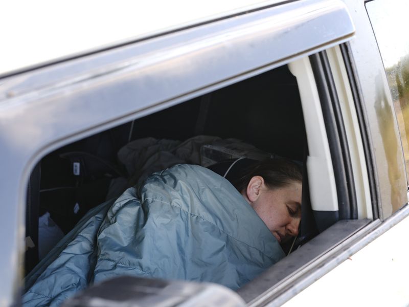 © Marysia Myanovska - Andriana in her only personal space at the front—in her own car. Here she sleeps, washes up, and can have some time alone.