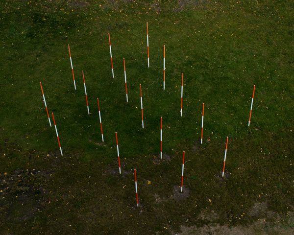 © Justus Lemm - Ranging rods marking the site of „Neanderthal 1“, the remains of the first recognized Neanderthal Neander ValleyGermany
