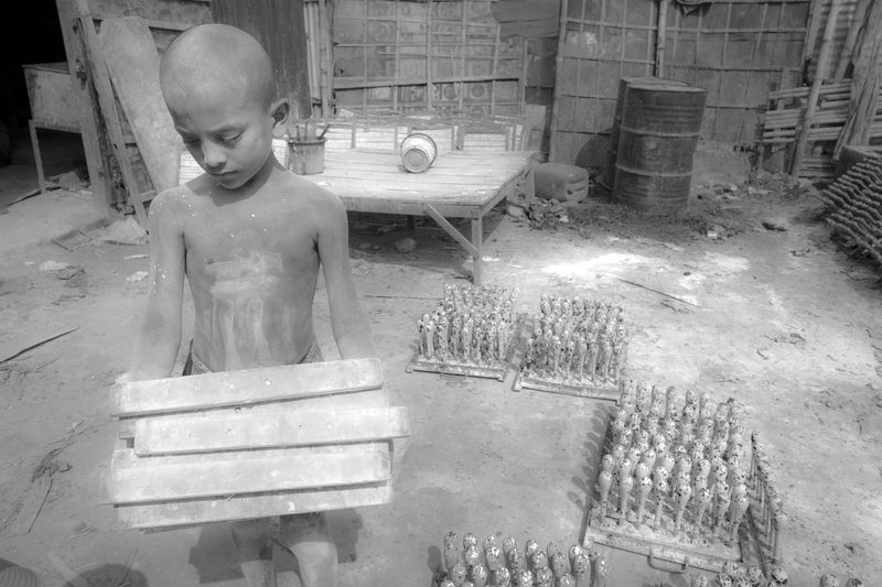 © Larry Louie - Image from the Stolen Childhood photography project