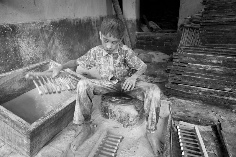 © Larry Louie - Image from the Stolen Childhood photography project