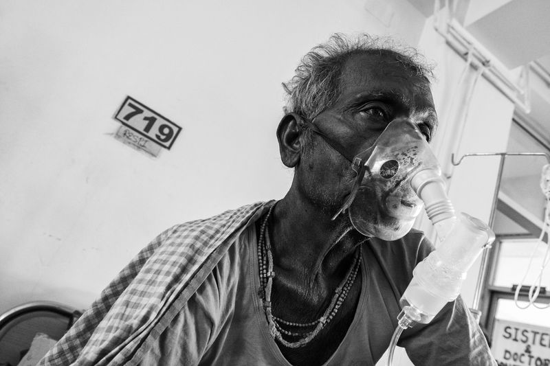 © Marco Sacco - A patient in the Respiratory Department of the Tribhuvan University Teaching Hospital during aerosol therapy.