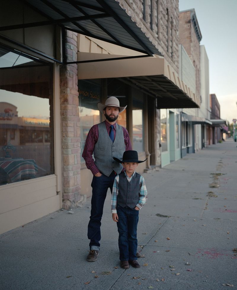 © Arnaud Montagard - Jack and his son, Nebraska. Jack is a cowboy poet and musician, always bringing his son to his performances.