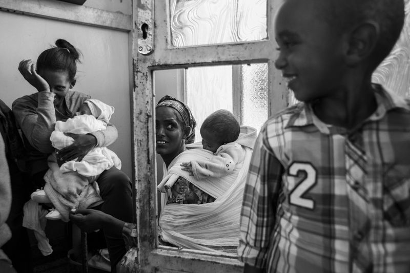 © Carlo Perazzolo - Families with children waits to be called for heart's screening exams in Orotta Hospital (Asmara)