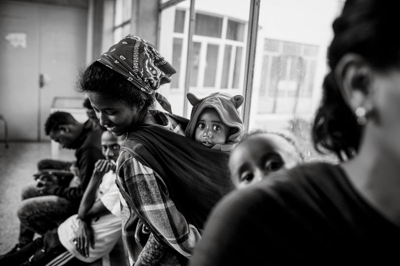 © Carlo Perazzolo - Families with children waits to be called for heart's screening exams in Orotta Hospital (Asmara)