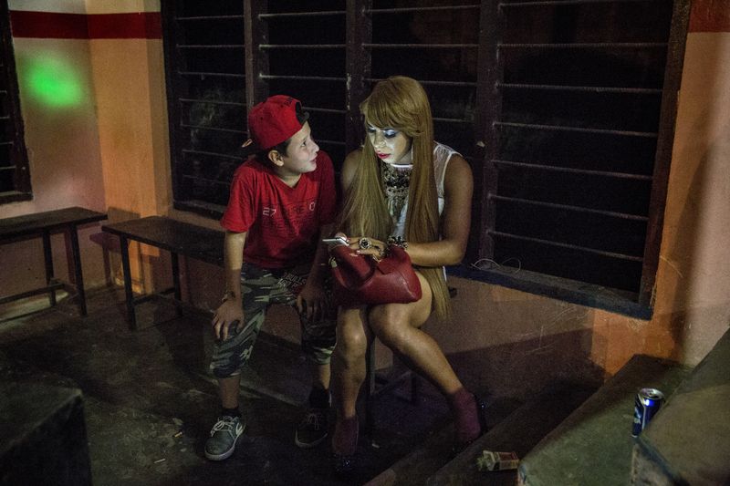 © Francesca Volpi - A young boy approaches Briana asking questions about her apperance.
