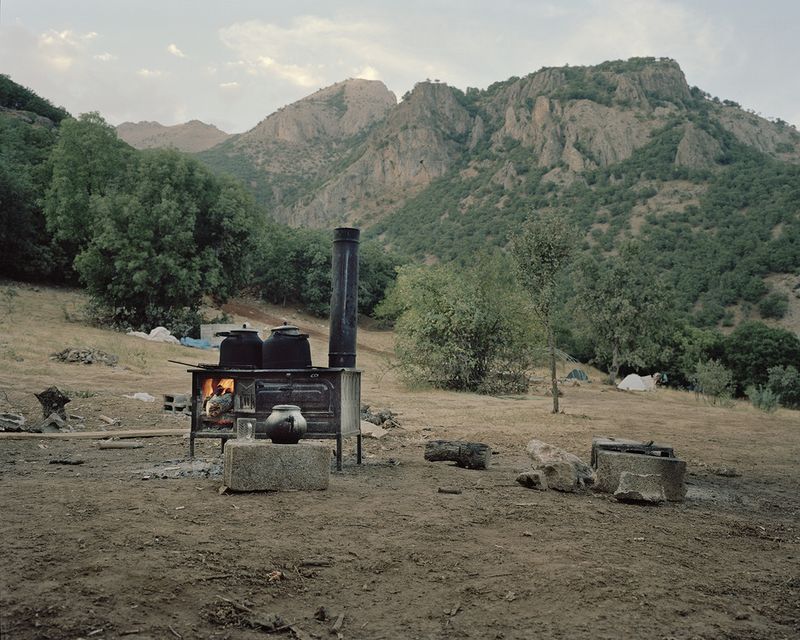© Miriam Stanke - Preparing tea on a cast iron oven in a temporary guerrilla camp.