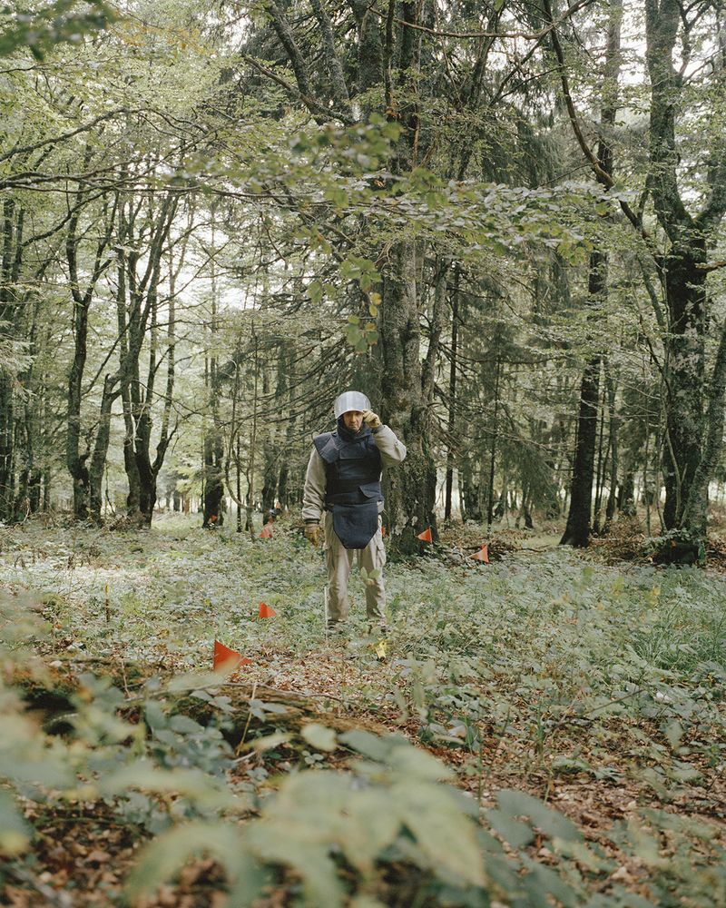 © Miriam Stanke - A deminer at work marking the ground for detecting mines in Glamoc