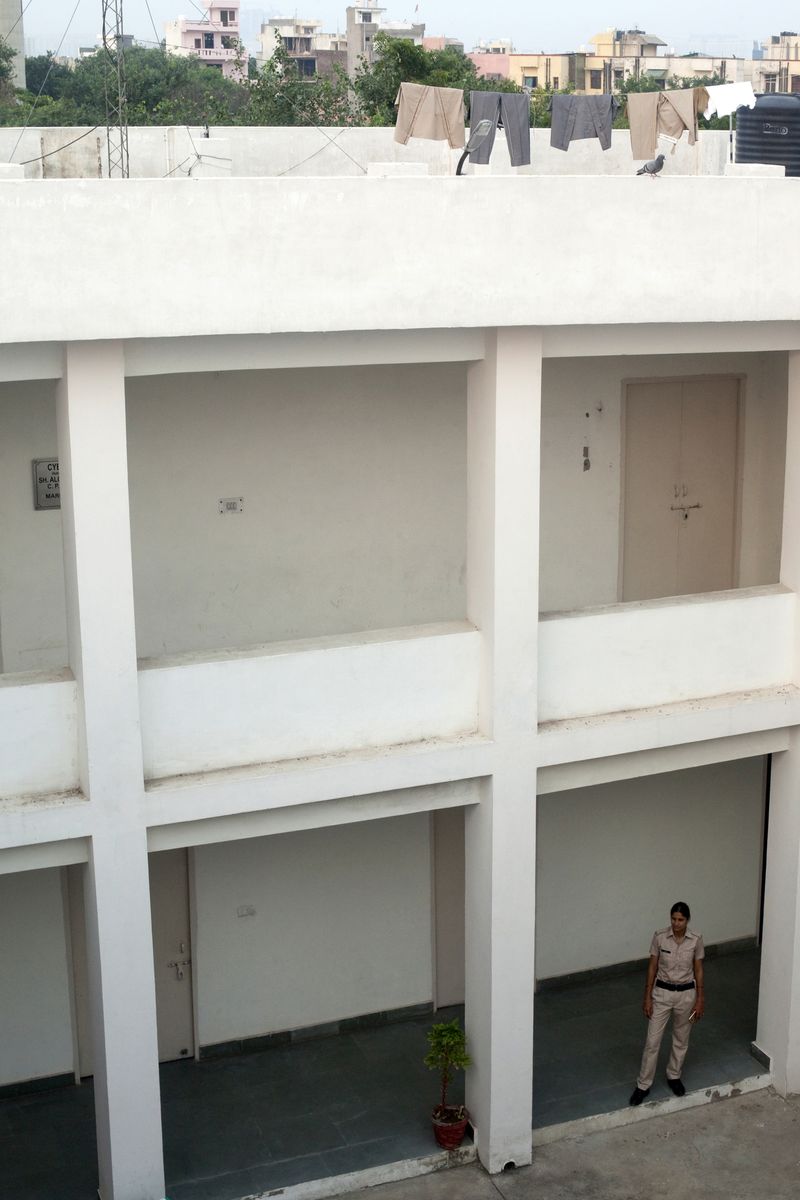 © Melanie Dornier - Inside view of AWPS, AWPS, Gurugram, Haryana, India, 2016.Constable Kavita is on the courtyard of the AWPS.