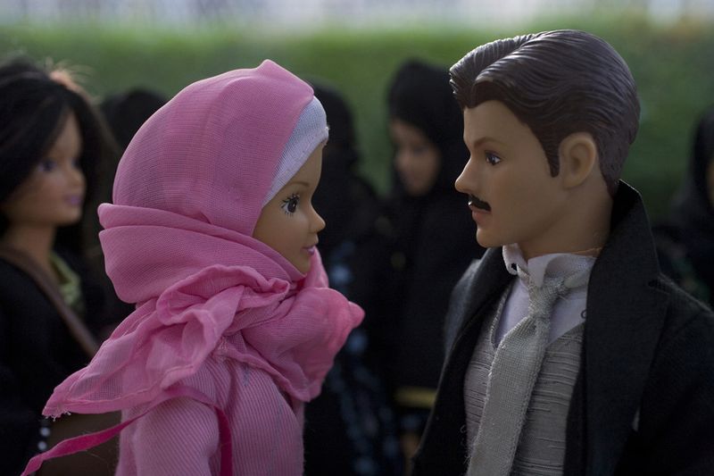 © Boushra Almutawakel - He approaches her and their eyes meet for the first time.....time stops. They talk
