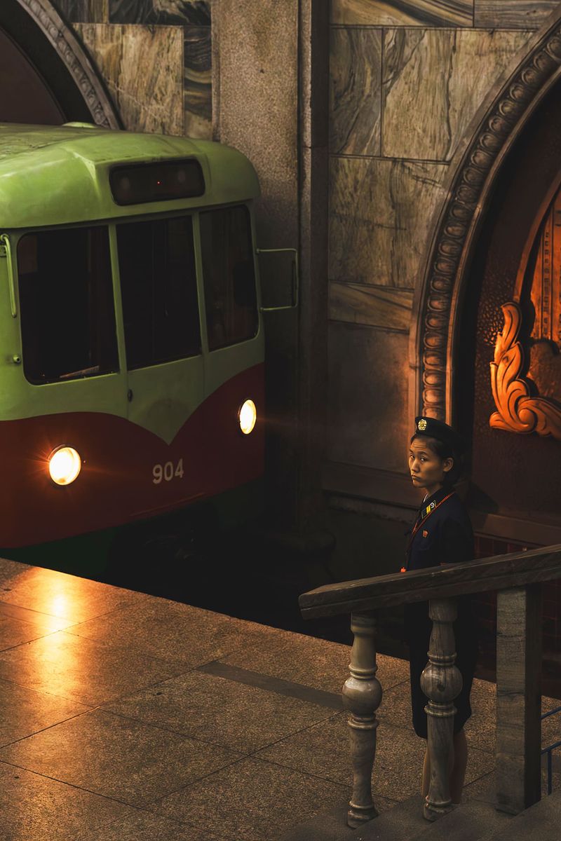 © Luke Gram - Station attendant, Pyongyang.