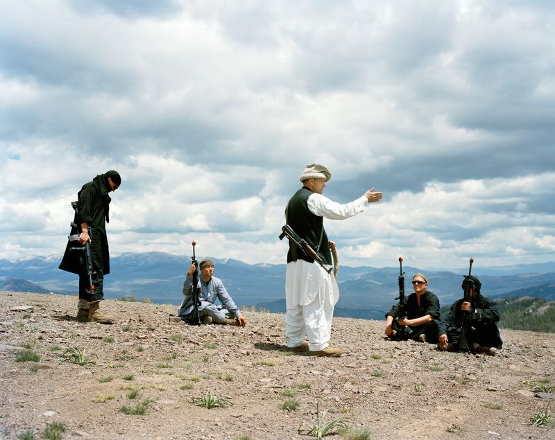 © Claire Beckett - Marine Major John Cowait playing the role of a warlord holding a terrorist training camp