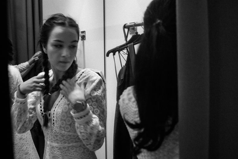 © Jost Franko - A teenager tries a dress in larger retail store in Ljubljana, Slovenia, on April 19th 2016.