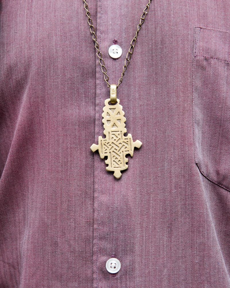 © Martin Toft - A cross necklace worn by Josh an Anglican deacon in the Diocese of Quebec. Gāspe. Canada 9 Aug 2017.