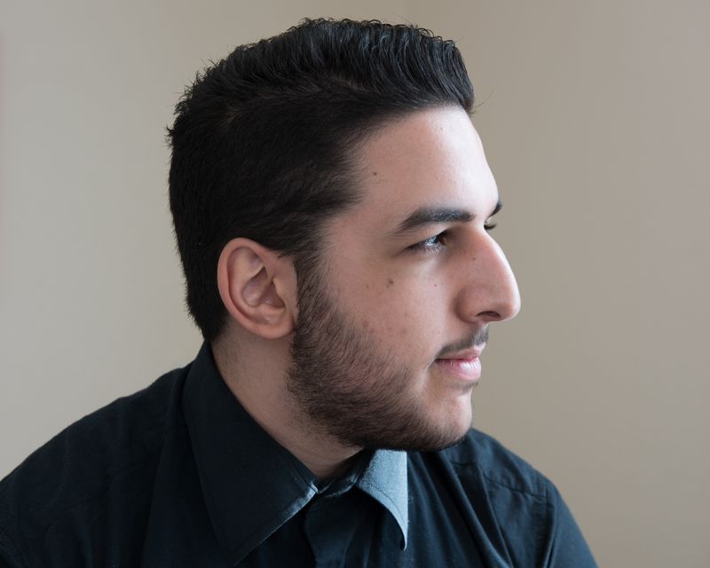 © Martin Toft - Baba Zouhier looking for work, Sarum Hotel, St Helier, Jersey. 7 April 2015 © Martin Toft