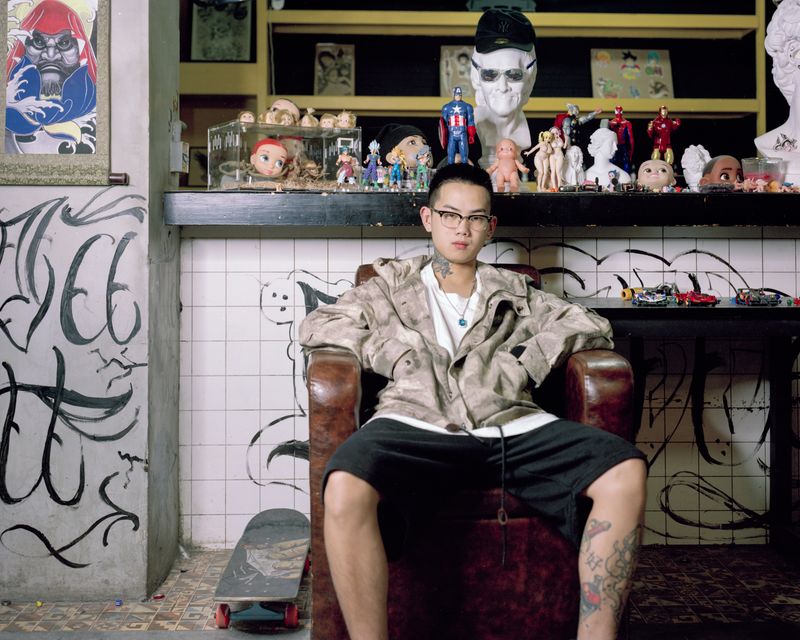 © Roban - A young tattoo artist in his underground studio. Jinhua, China.