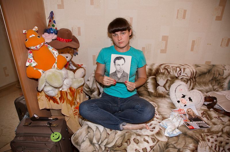 © Victoria Crayhon - Tanya with her Grandfather's Picture,Vladivostok RF 2012 30 x 44 inch archival pigment print