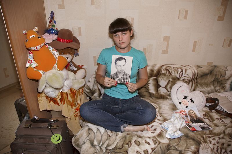 © Victoria Crayhon - Tanya with her Grandfather's Picture,Vladivostok RF 2012 30 x 44 inch archival pigment print