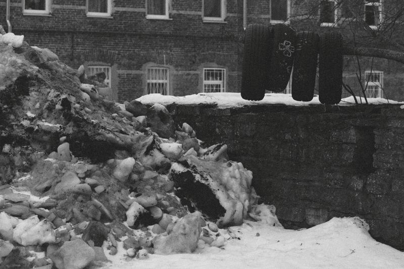 © Ksenia Shupenya - Gritty urban detail — debris, walls, perhaps decay; texture is loud. Ilford Delta 3200