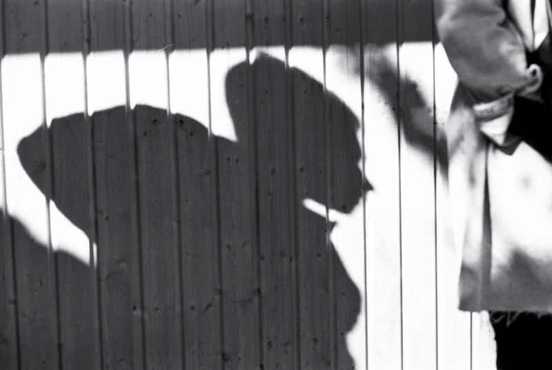 © Ksenia Shupenya - Abstract play of light and shade - a silhouette against a wall. Ilford Delta 100