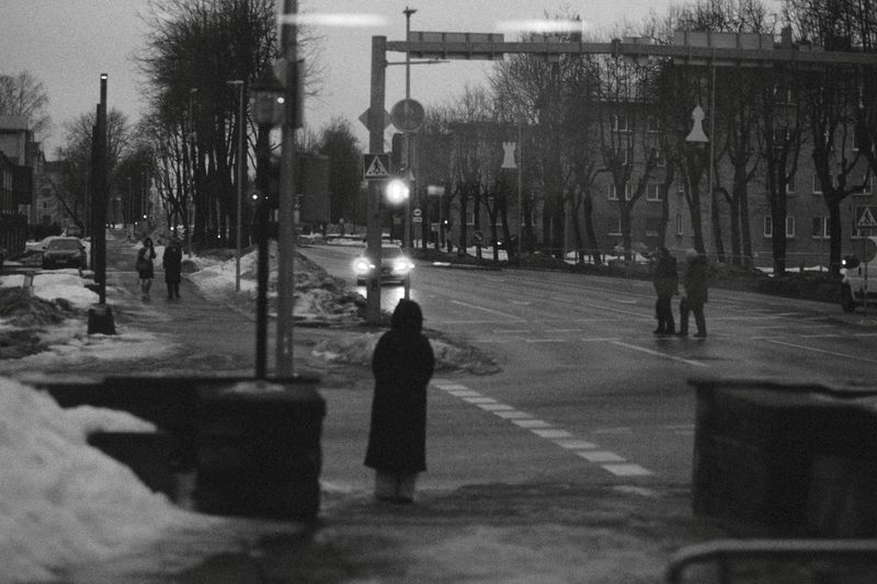 © Ksenia Shupenya - Street at dusk - soft light mixed with shadows; quiet presence. Ilford Delta 3200