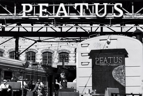 © Ksenia Shupenya - A quiet street moment, crisp lines and light; finding geometry in the everyday. Ilford Delta 100