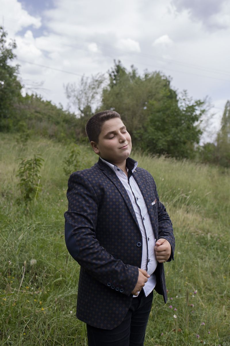 © Parisa Azadi - AUGUST 4, 2018 - Milad Ebrahimi stands for a portrait during his cousin’s engagement party in the village of Alamut, Iran.