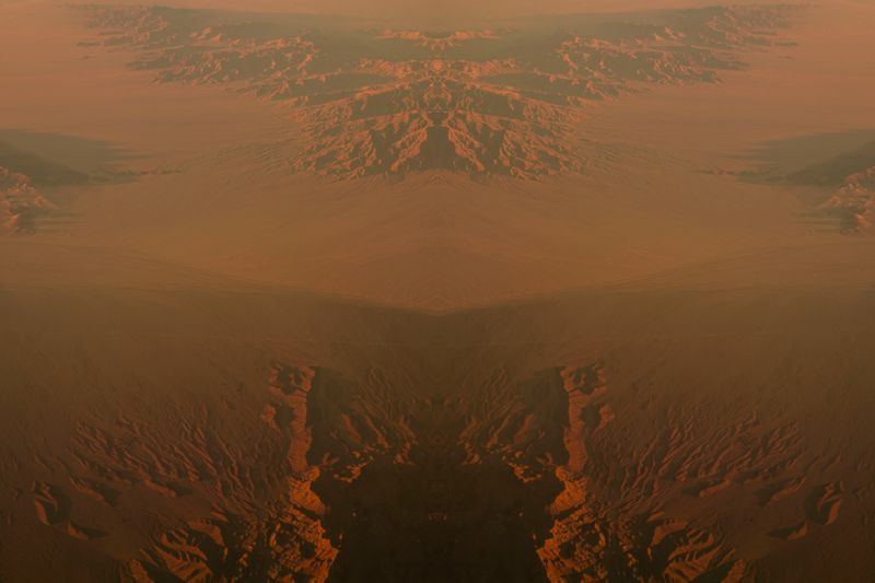 © Mackenzie Calle - Mirrored aerial landscape.