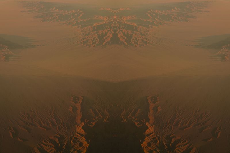 © Mackenzie Calle - Mirrored aerial landscape.