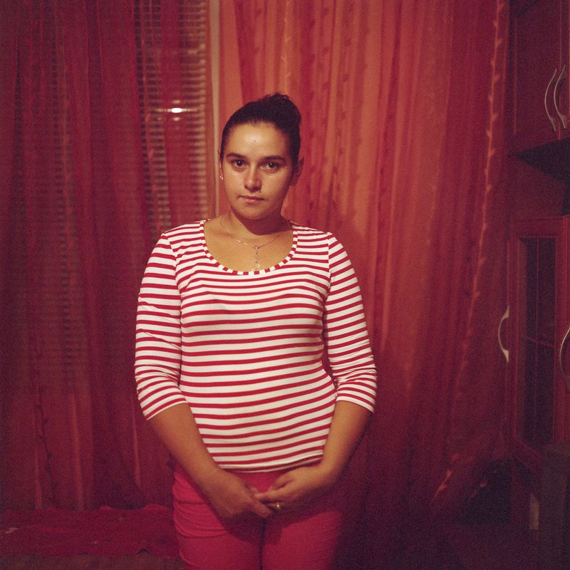 © Chiara Fossati - Aline in her family’s home in Tulcea , Romania.