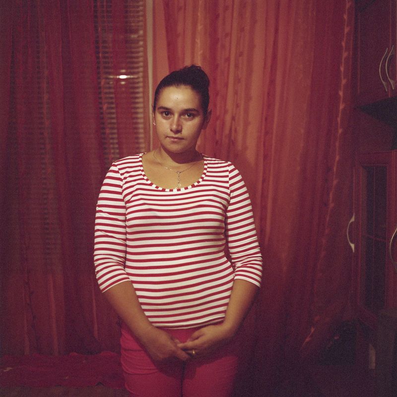 © Chiara Fossati - Aline in her family’s home in Tulcea , Romania.