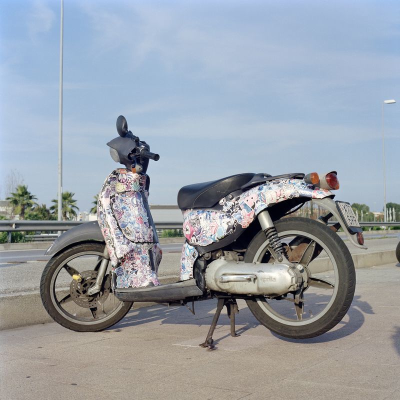 © Chiara Fossati - A Scarabeo covered in stickers, typical scooter owned by Italian teenagers. Italy.