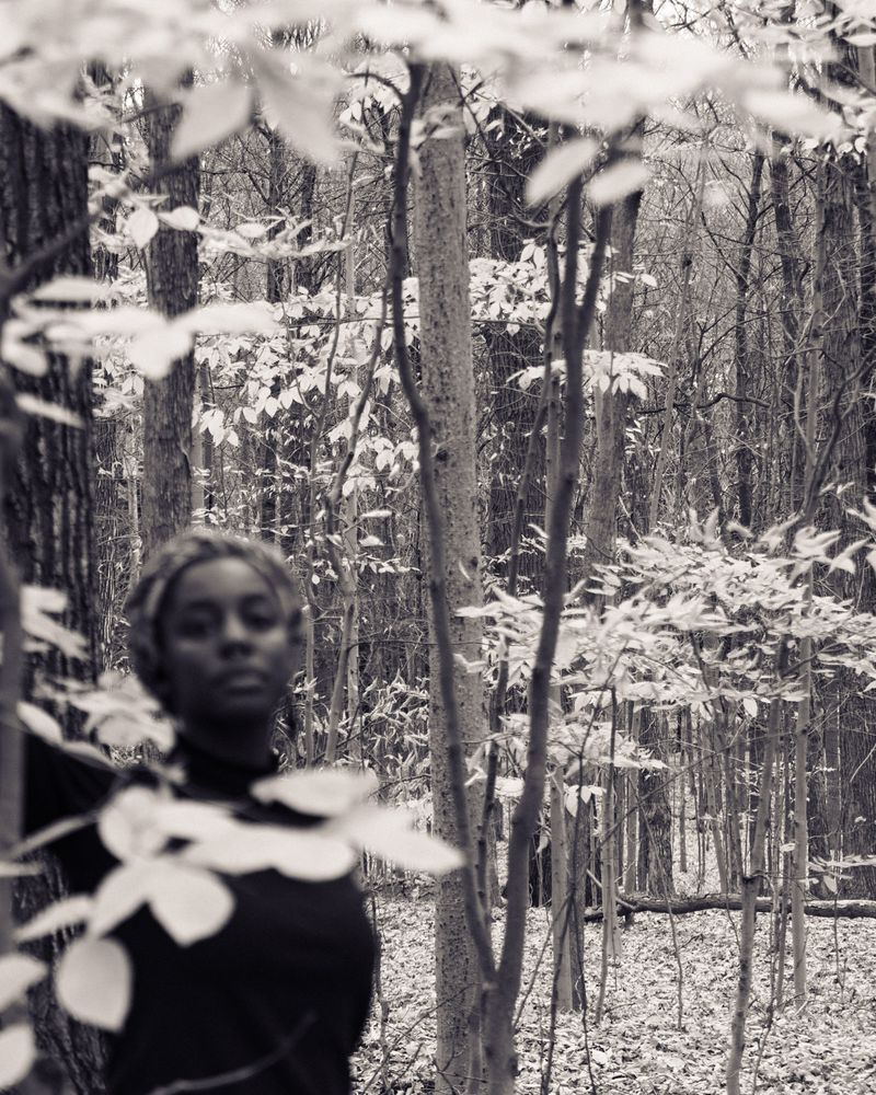 © Eleonore Menga - Black woman emerges amongst the depths of the woodland, Montreal 2023