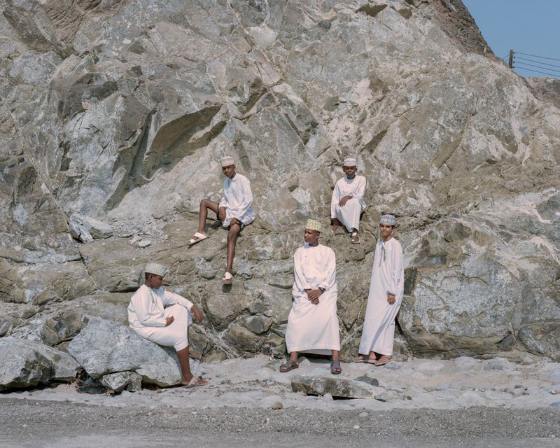 © VALENTIN JOSEPH VALETTE - Sons of Omani entrepreneurs pose for a portrait in their neighborhood reserved for local investors. Qantab, January 2023.