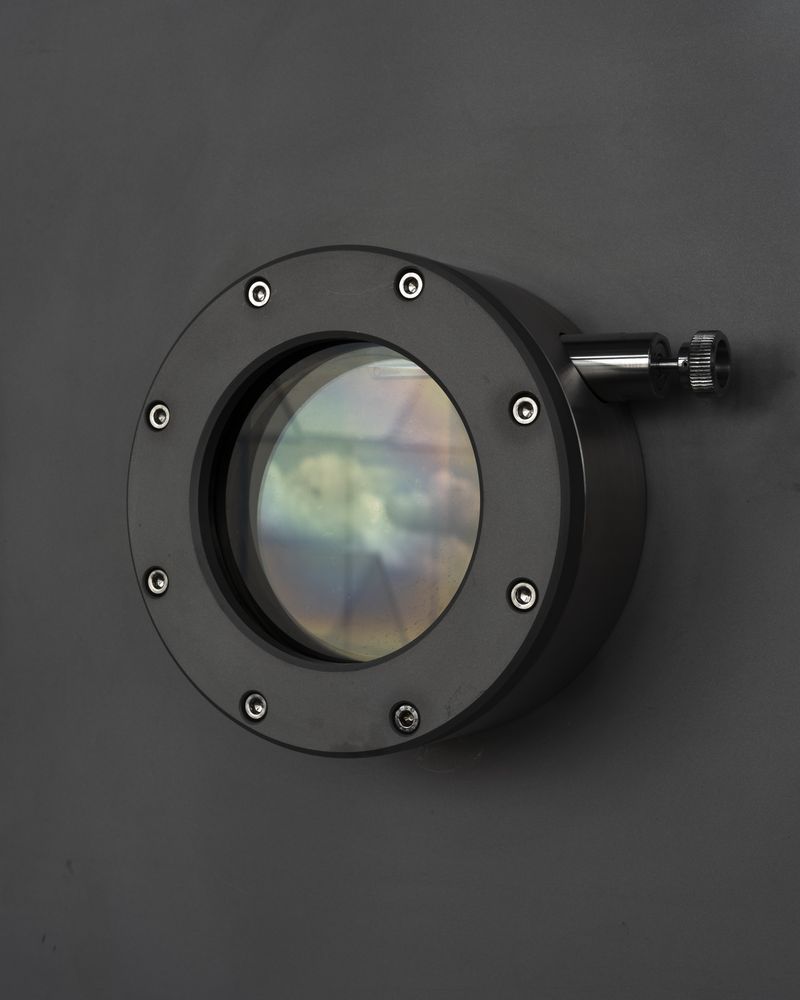 © luca spano - Protective window with cloud reflection at Leibniz Institute of Photonic Technology.