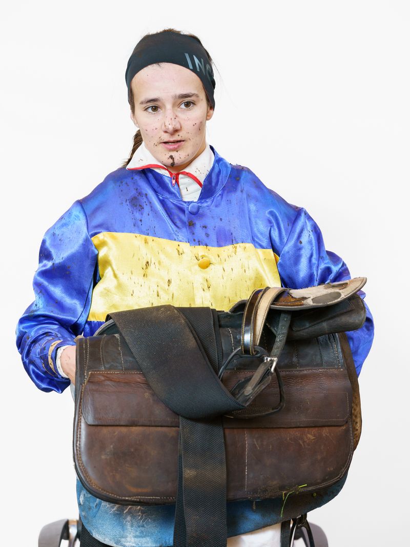 © Theresa Wißmann - A jockey is being weighed on the weighing chair after the race.