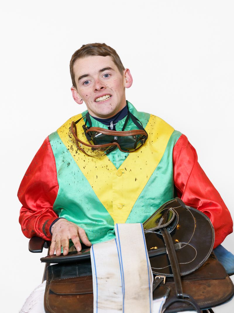 © Theresa Wißmann - A jockey is being weighed on the weighing chair after the race.