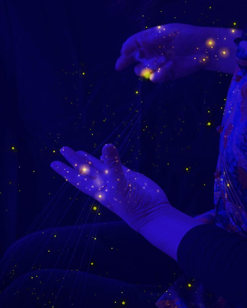 © Yiming Zhu - Universe Between The Hands