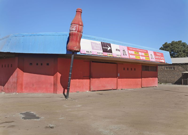 © Graeme Williams - Mookgophong, South Africa. 2017. Tony's Cash and Carry has closed up shop as the country's economy slides into freefall.
