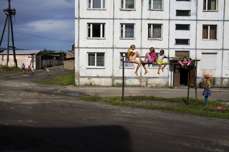 © Marco Pighin - Slyudyanka, Irkutsk Oblast, Russia. August 2010. Buildings where many people working in the paper mill live.