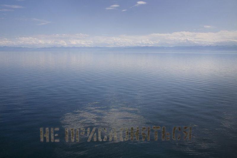 © Marco Pighin - Lake Baikal, Irkutsk Oblast, Siberia, Russian Federation. August 2010. Lake Baikal seen from a train window.