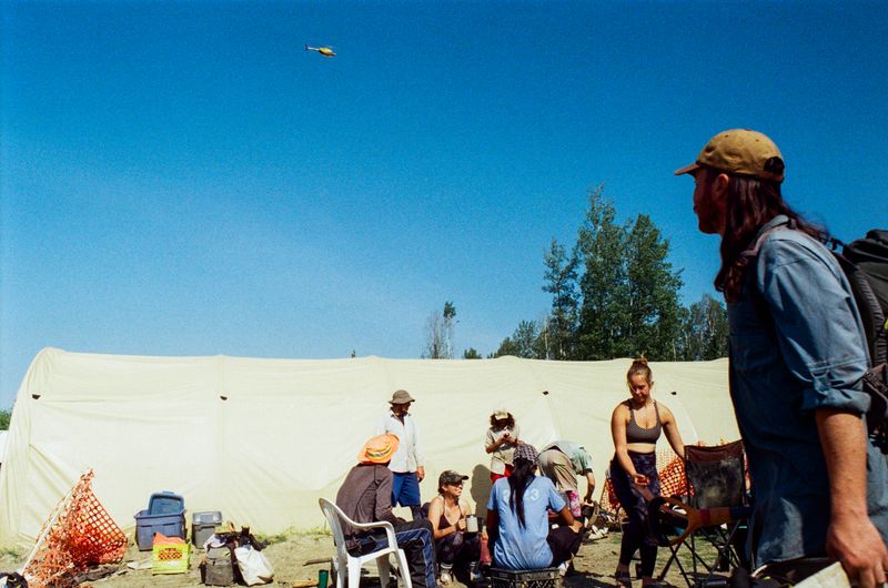 © Aidan Clark - Getting up from smoking in the "smoking section" to get ready for our incoming flight.