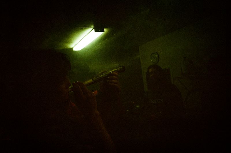© Aidan Clark - Planters hotboxing the cook shack with a 24 inch joint on their night-off.