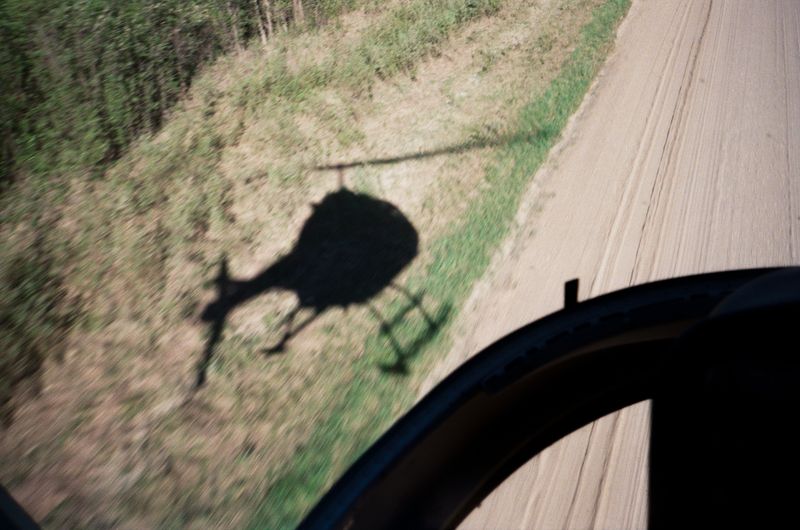 © Aidan Clark - Taking-off to fly to the cut-blocks to work all day.
