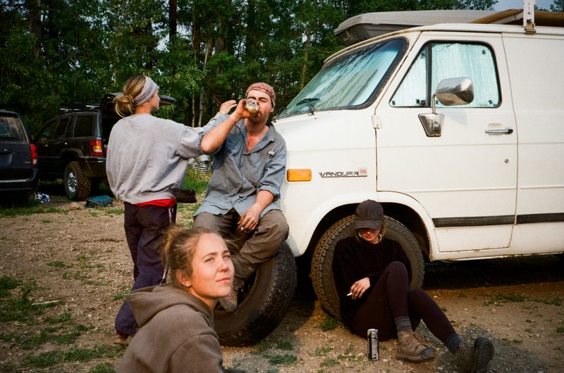 © Aidan Clark - Planters sitting and sharing drinks while debriefing after a particularly bad day of work.