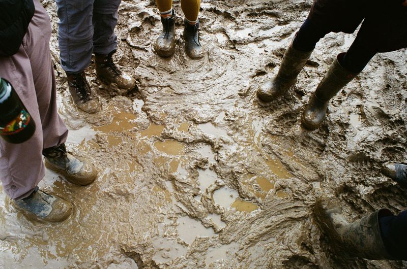 © Aidan Clark - The ground in camp after multiple days of non-stop rain.