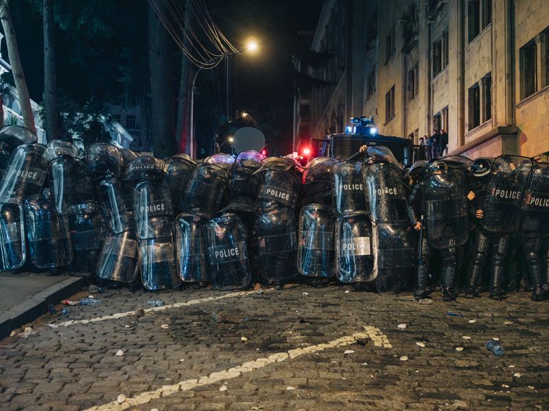 © Lea Greub - Police at the demonstration against the law on ‘foreign agents’ in front of the parliament. Tbilisi, 2023.